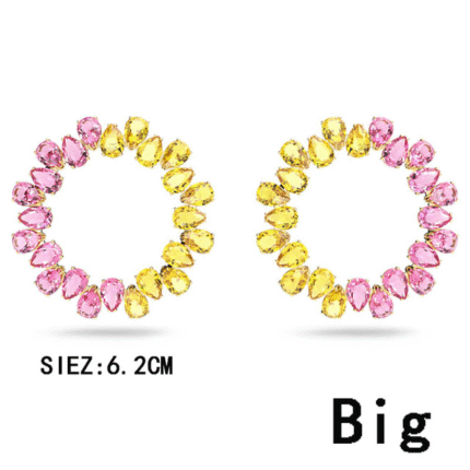 5615619  High quality Swarovski earrings with original logo.